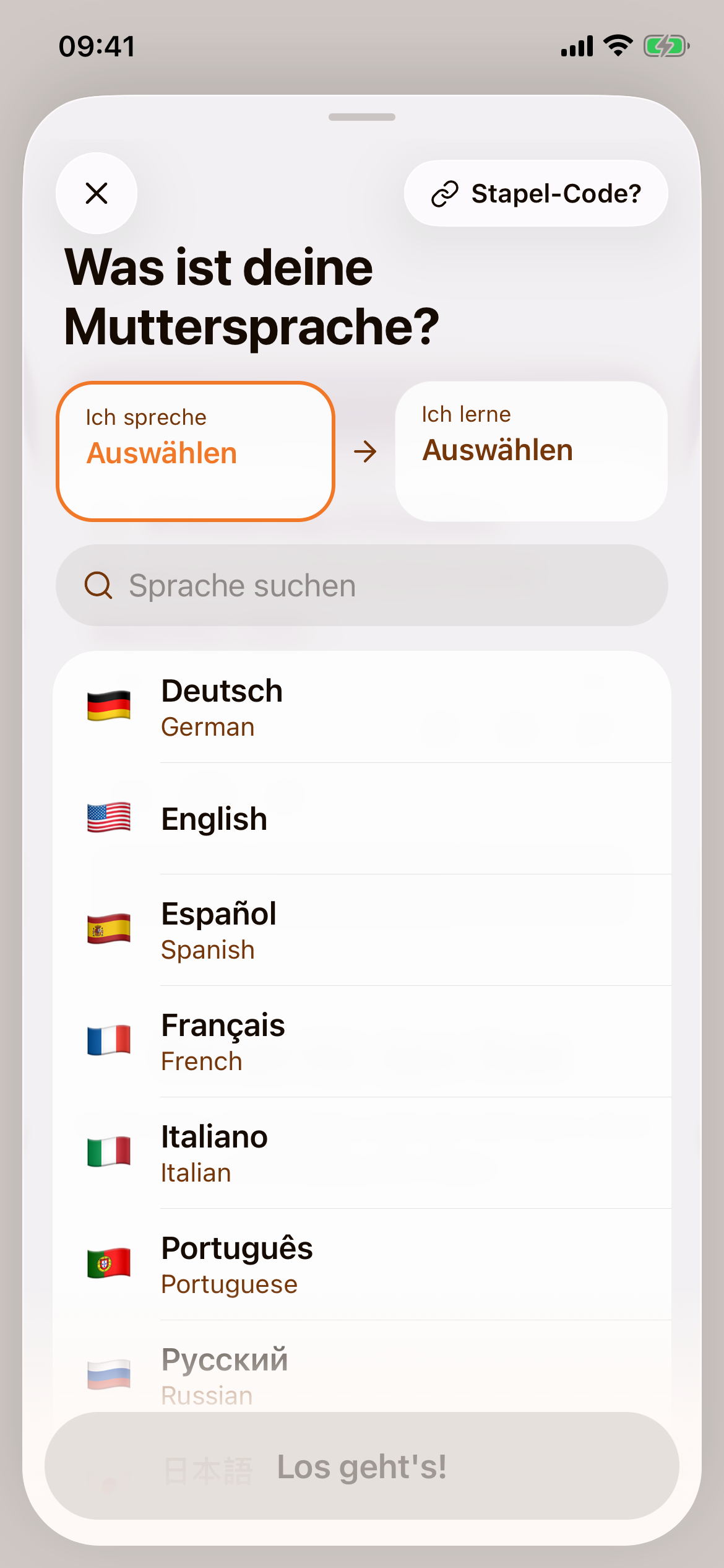 Die Sprachauswahl mit der Überschrift „Was ist deine Muttersprache?“, den Feldern „Ich spreche“ und „Ich lerne“ und darunter einer durchsuchbaren Liste mit Sprachen wie Deutsch, English und Español