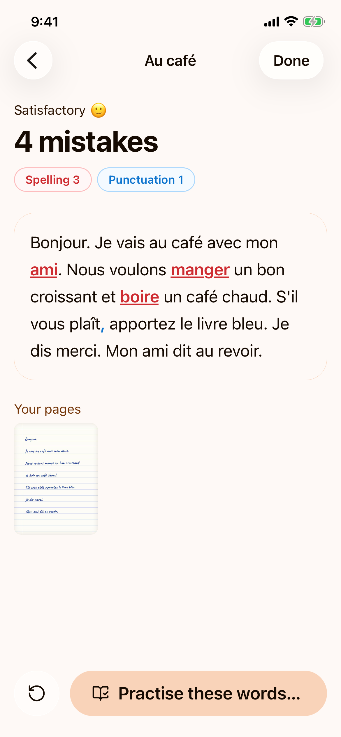 The result of a dictation: Satisfactory, 4 mistakes, the text with ami, manger and boire underlined in red and a missing comma in blue, and the photo of the handwritten page