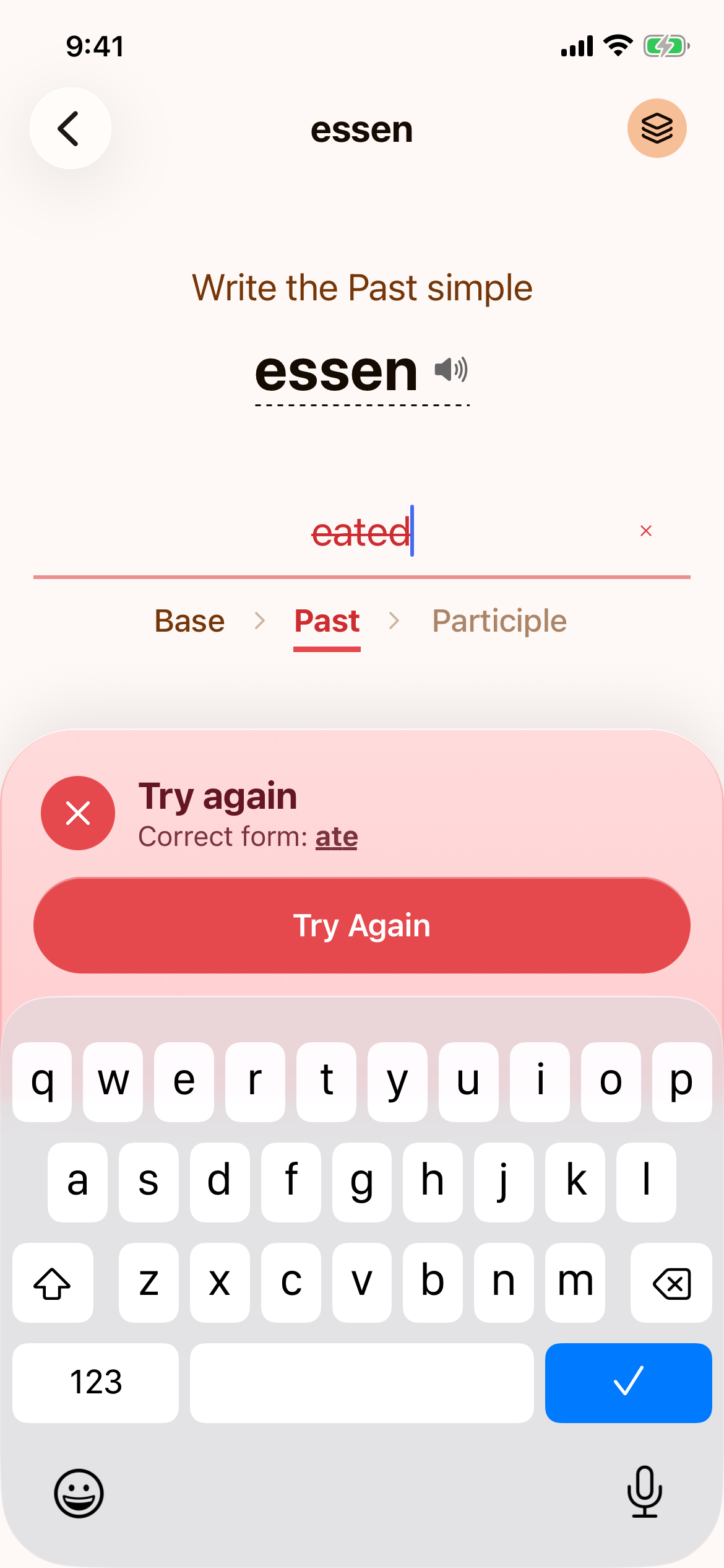 The past simple step with "eated" struck through in red and the correct form "ate" shown underneath, with a Try Again button